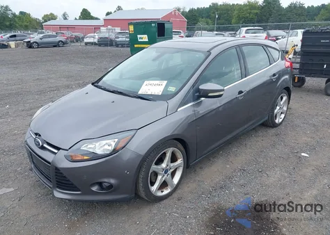 2012 Ford Focus Titanium z USA, uszkodzony, nr VIN 1FAHP3N21CL433734